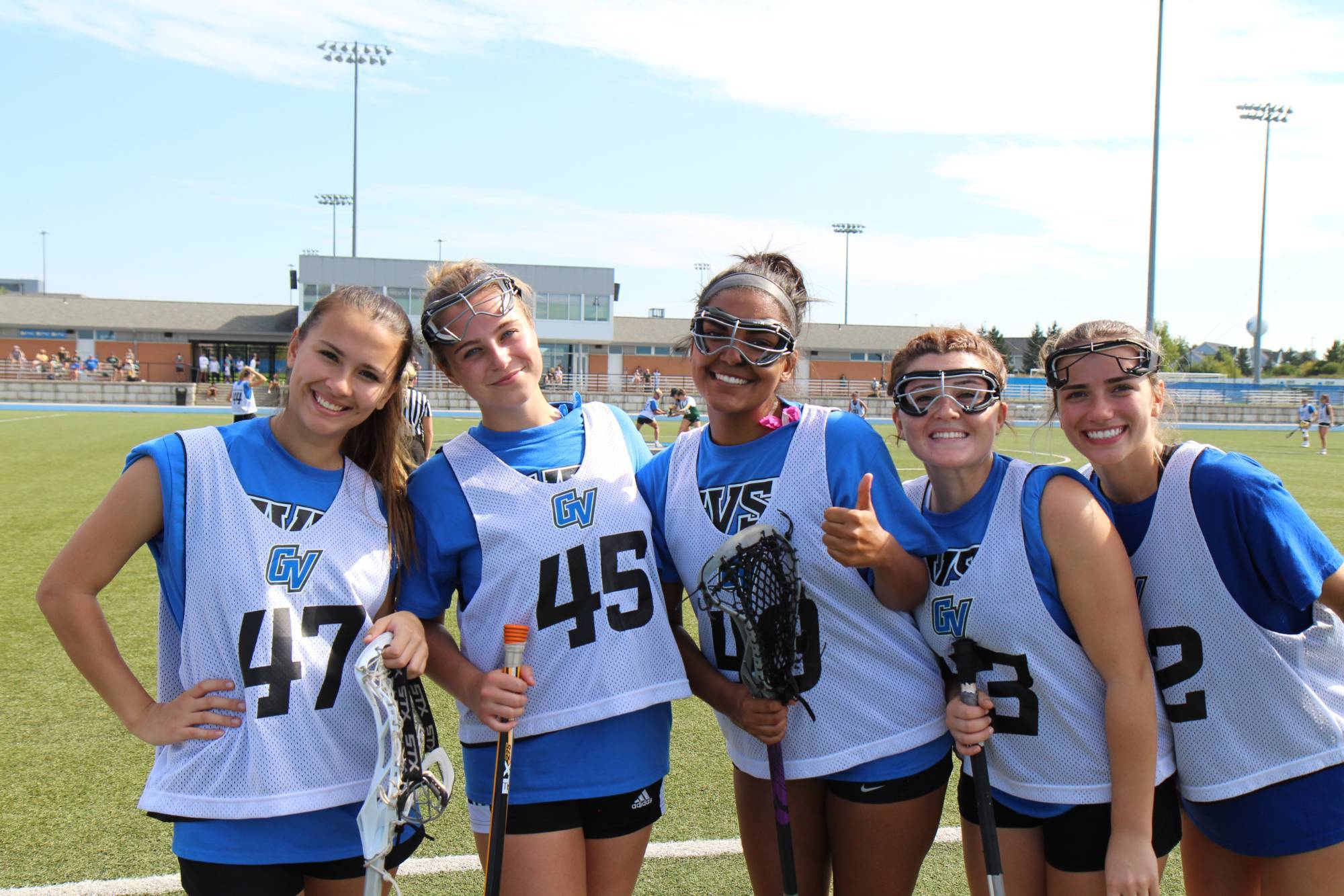club women's lacrosse team on the field for a group picture